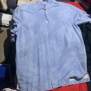 selling a blue size M button up shirt